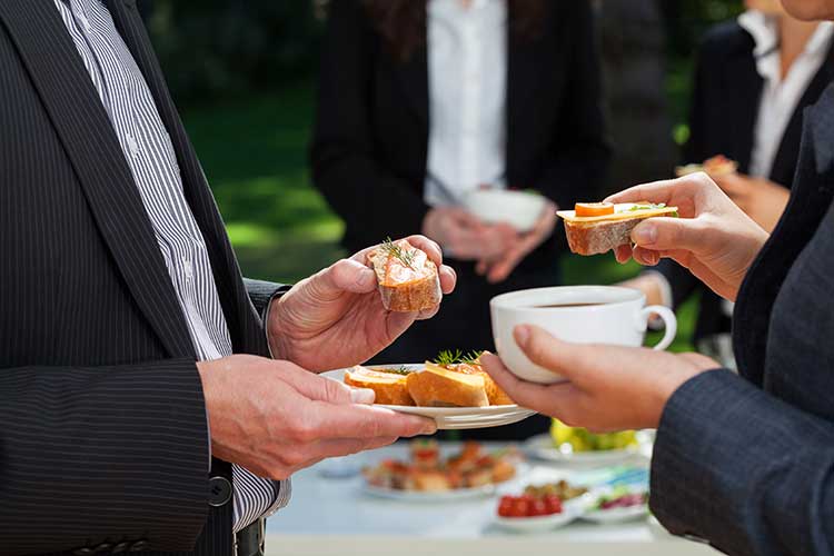 Guests enjoy the catering at a Love's Independent Funeral Directors funeral